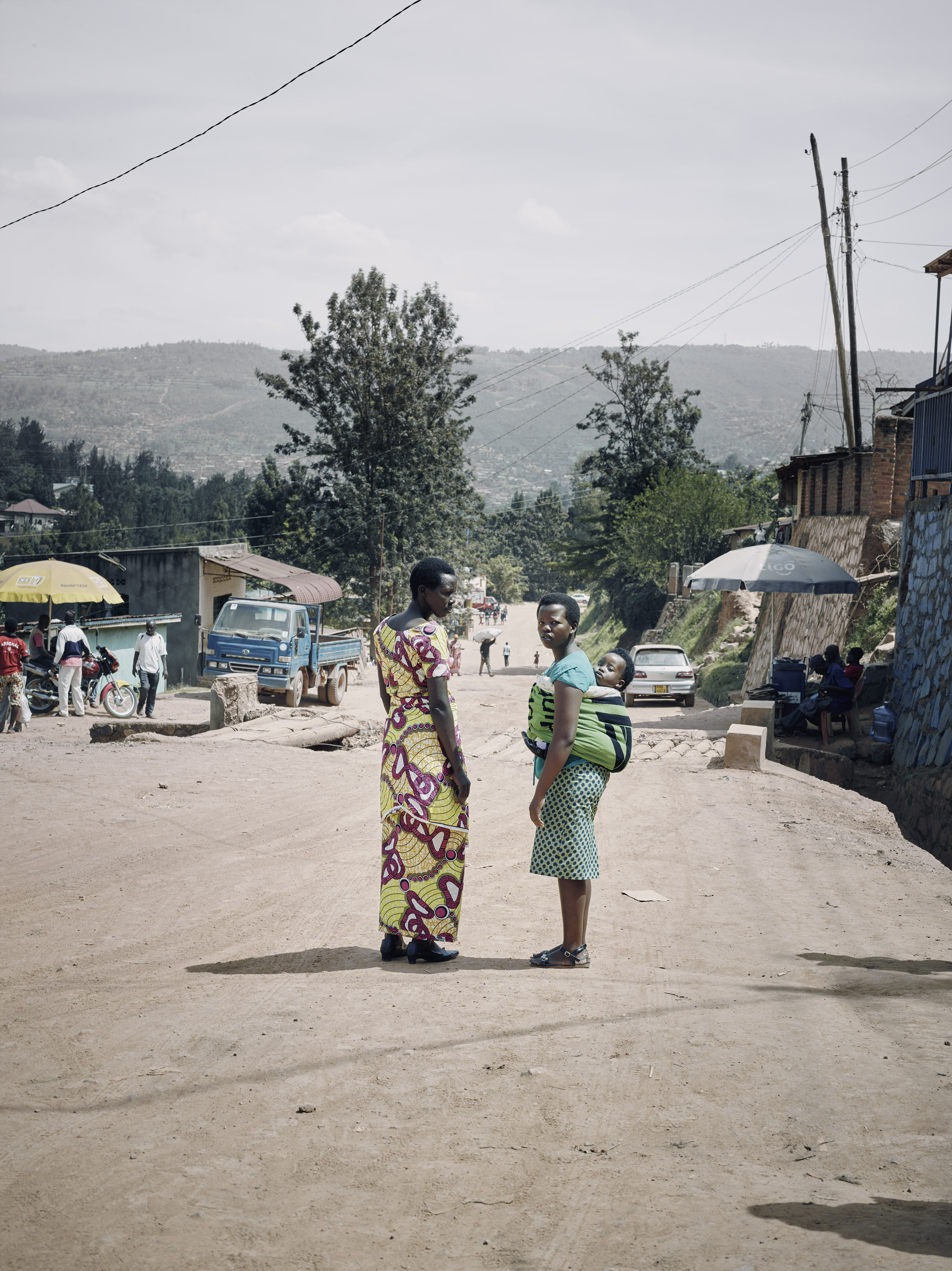 Gertruide N. with her daughter Emertha, Kigali, 2018 
C-Print on Kodak Endura Paper
160 × 122 cm
© Olaf Heine/ VG Bild-Kunst, Bonn 2024